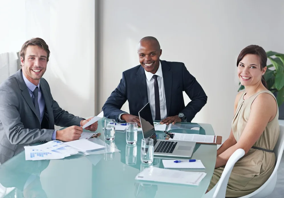 team diversity smiling portrait office meeting finances strategy table with laptop woman men business people together boardroom collaboration partnership support 590464 373836